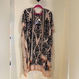 Angie Taupe/Black cardigan with orange Pompoms